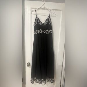 Lucky Brand Black Maxi Drwss with white embroidered floral trim, size medium